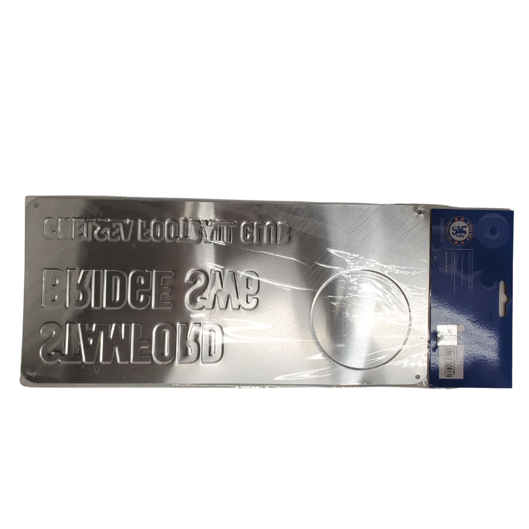 Back View - Announce your Chelsea fandom with this Stamford Bridge SW6 Chelsea street sign. It comes ready to hang! It is the perfect addition for your in-home bar! It measures approximately 7" x 5.5"