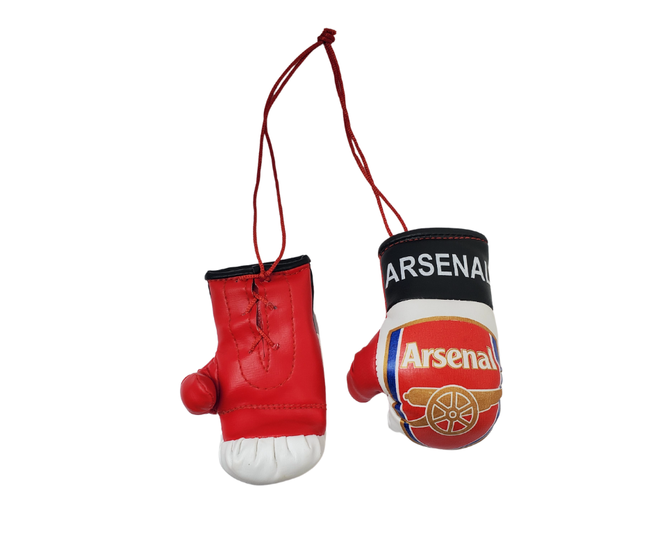Tied together with a red string. The red gloves have the official Arsenal crest with a gold cannon. Around the wrist of the gloves is a black band with white text reading "Arsenal." . Approximately 5 inches x 3 inches.