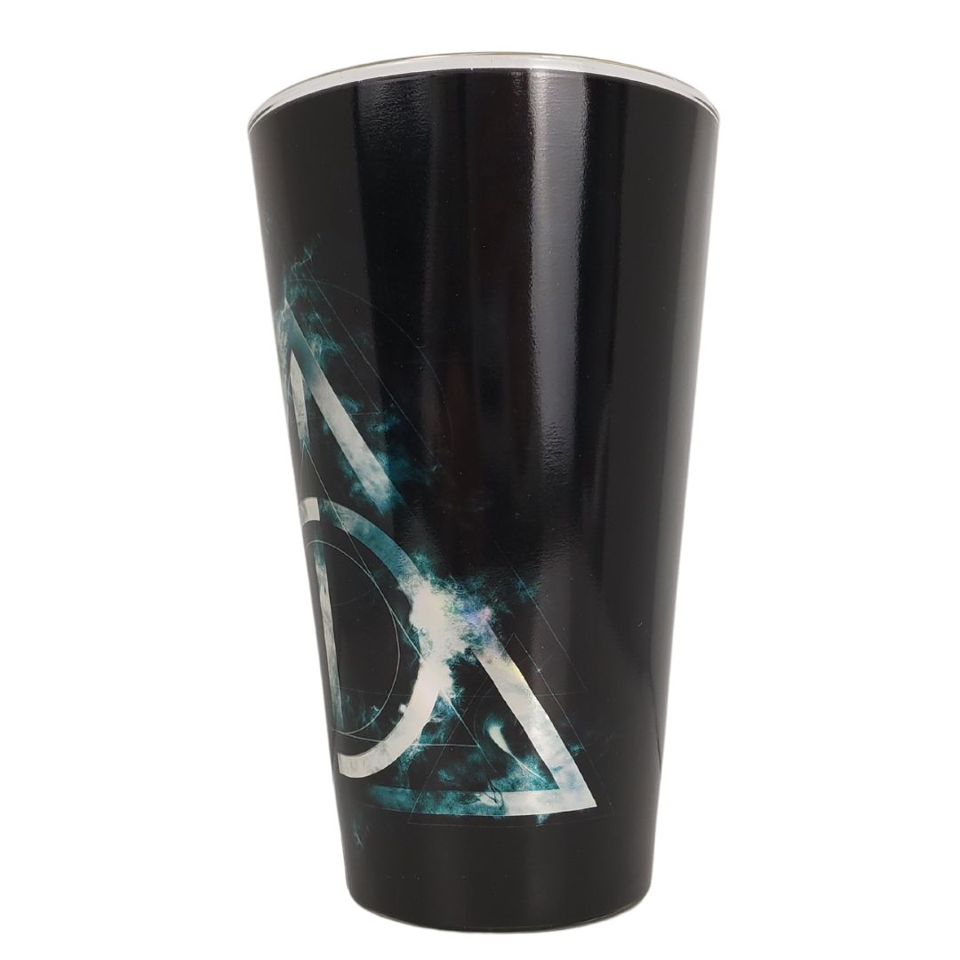 Together they make the master of death. The invisibility cloak, the elder wand, and the resurrection stone. These three items make up the Deathly Hollows symbol. Watch your favourite movie series with a glass of butterbeer in our Harry Potter drink glass! Care Instructions: Not suitable for dishwasher or microwave use.