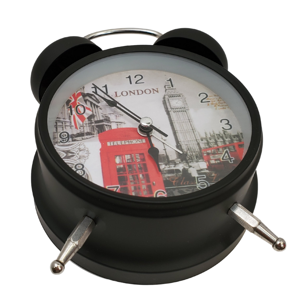 This classic-looking alarm clock with a British twist is ideal for the bedside. Large print numbers, super loud alarm will make sure you're never late for work again! Metal material, glass lens, and cute little feet. Battery operated Battery not included