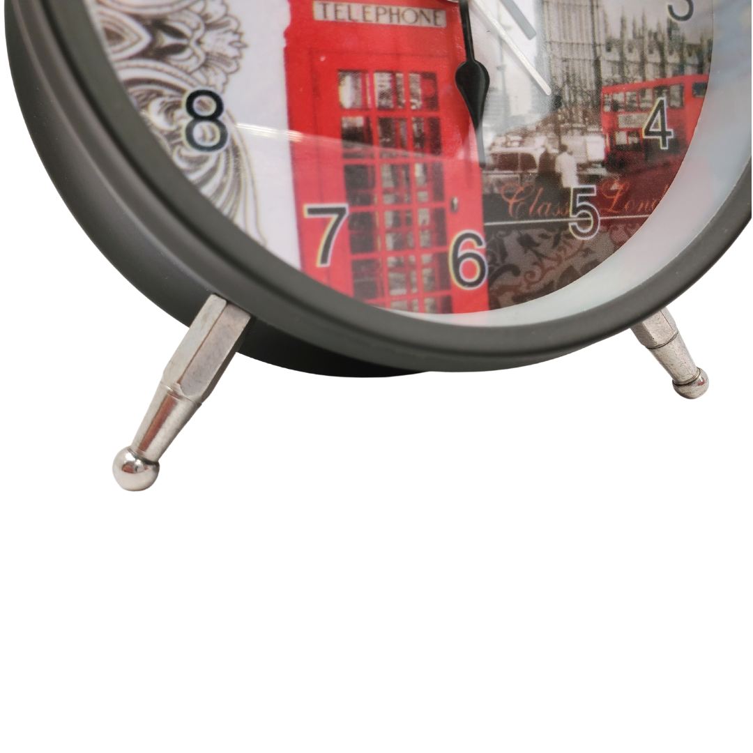 This classic-looking alarm clock with a British twist is ideal for the bedside. Large print numbers, super loud alarm will make sure you're never late for work again! Metal material, glass lens, and cute little feet. Battery operated Battery not included
