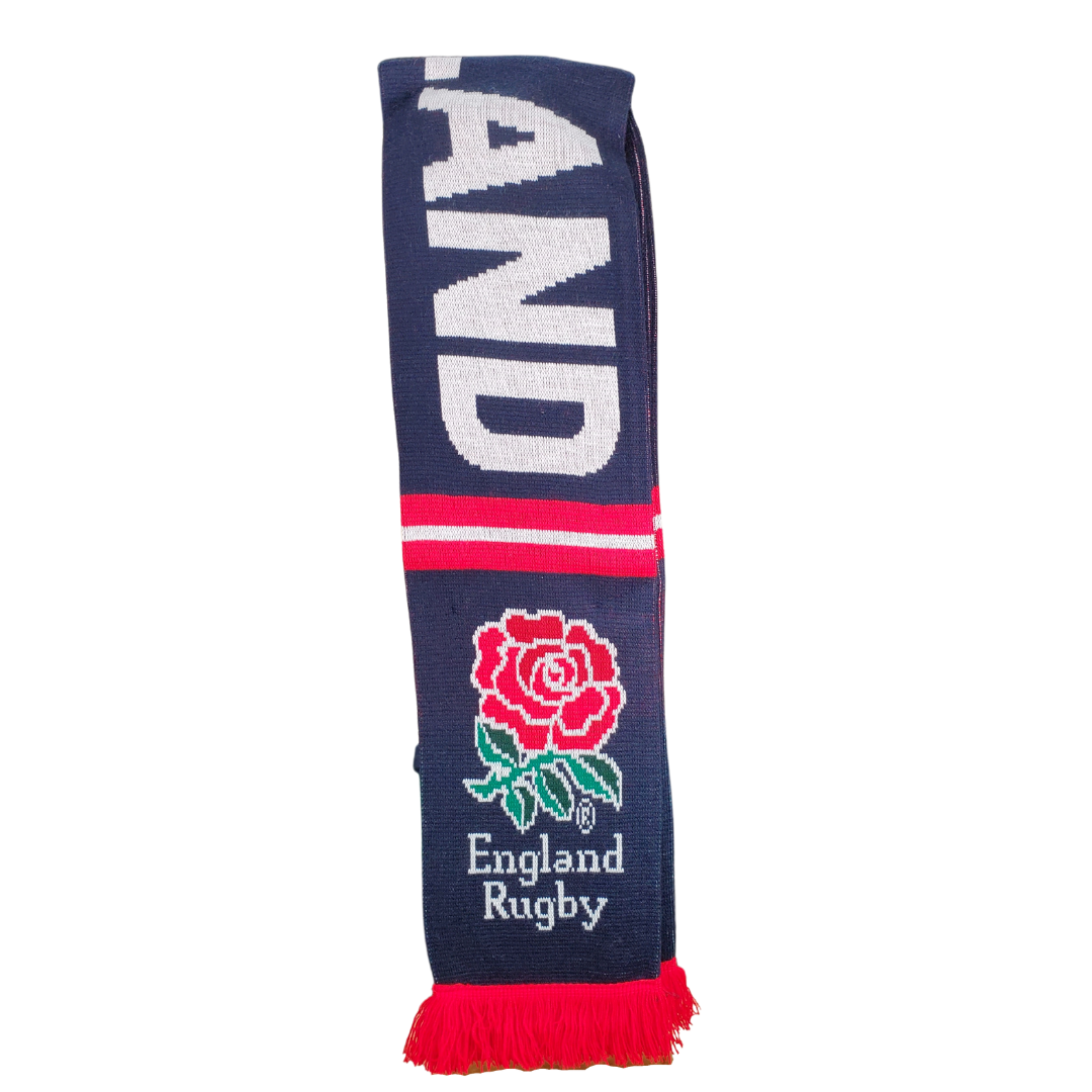 Whether you're cheering from the stands or just need to keep warm in the cold this scarf is ideal. The England Rugby decoration means your pride will be on display wherever you go. This gorgeous knit scarf is perfect for the rugby fan in your life. This scarf features the England rubgy logo at each end and the text "ENGLAND" along the length.