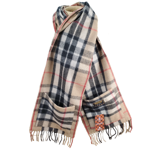 Forget dresses with pockets, we now have scarves with pockets!!! This gorgeous scarf is made with 100% merino wool. Originally worn by shepherds tending their flocks in the Scottish Border area. Now worn globally as a timeless pattern, everyone needs a piece of tartan fabric in their wardrobe. Imported from Scotland