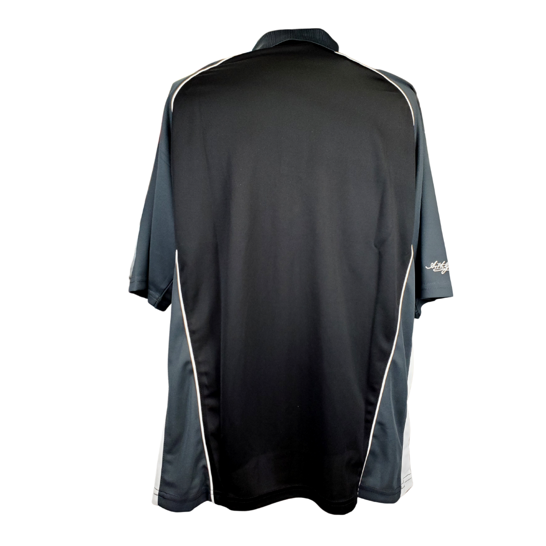 This activewear Tee is made with soft silky fabric that allows your skin to breathe and for sweat to be absorbed quickly. Suitable for sports performance and casual wear. Colour: black, with grey and white accents Care Instructions: Machine wash only with like colours, and do not use fabric softener.