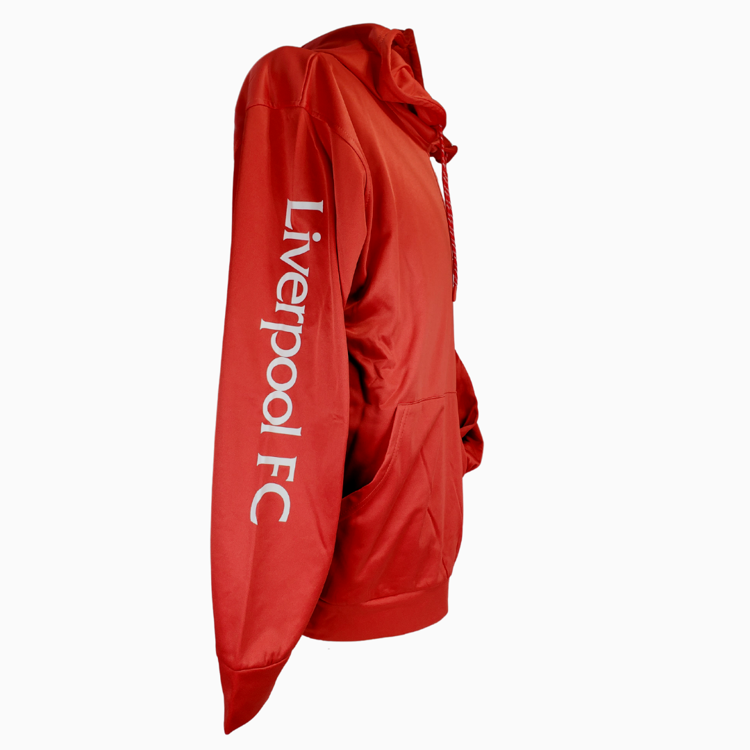 Side View - Whether you are cheering from the stands or cheering from the couch you can show your team spirit off with this vibrant red hoodie. This Liverpool Football Club hoodie has the official team logo printed on the chest with the text L.F.C. immediately below it. Down the sleeve has the printed text "Liverpool FC." Also features a kangaroo patch and drawstring hood.