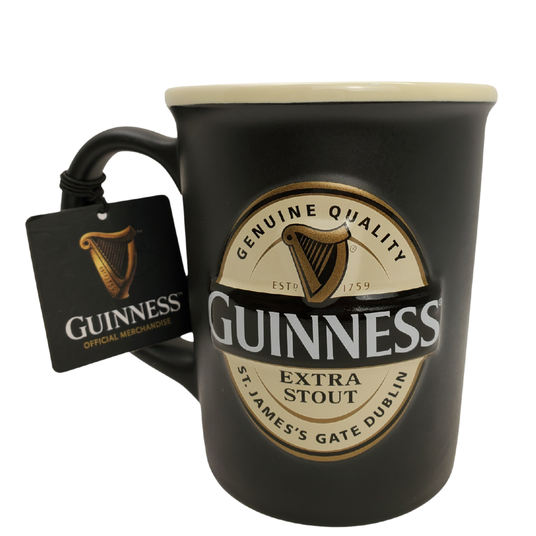 Fuel your morning with this official Guinness coffee mug. This stylish mug is sure to be your favourite go-to mug when brewing a cuppa! Designed with the Guinness label it is sure to remind you of Ireland, the home of the black stuff. Official Guinness Product Ceramic Microwave and dishwasher safe