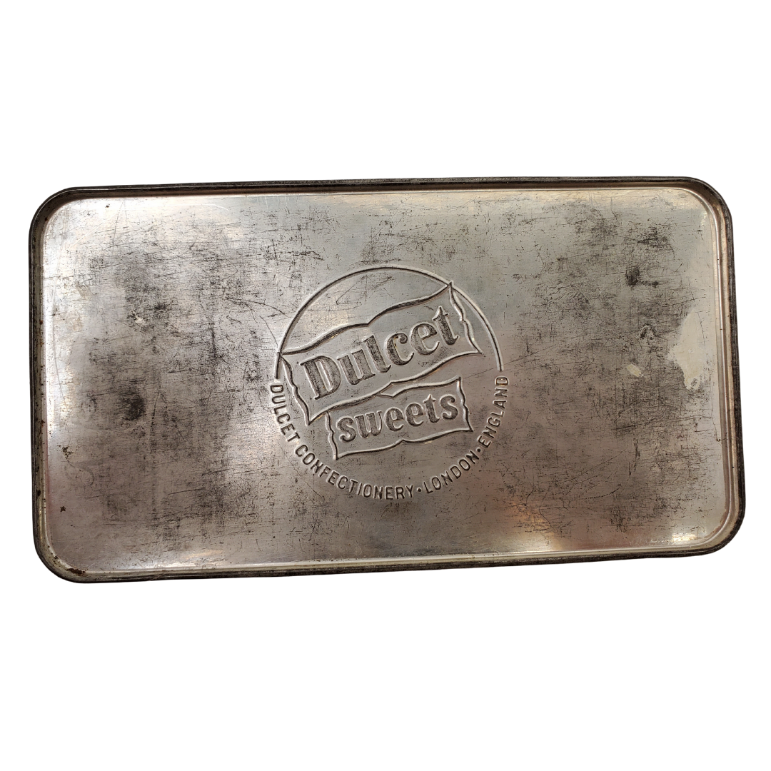 Bottom View of Tin - 7.5" x 4" x 3" 1950's tin. Very sought after by collectors.