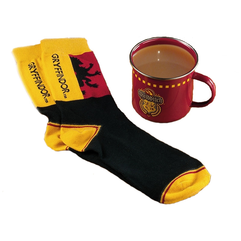 Snuggle up next to a warm fire on your next camping trip with this Harry Potter camping mug and cozy socks. The Harry Potter Gryffindor Quidditch mug and socks set is the perfect duo for any Harry Potter fans. Show your Gryffindor pride with this cute set. This cozy set comes with a standard-sized mug and a pair of men's size 7-11 (UK) socks. The tin mug features the Hogwarts crest and the word ‘Quidditch’ on its side, and the socks feature the Gryffindor lion and house’s name.