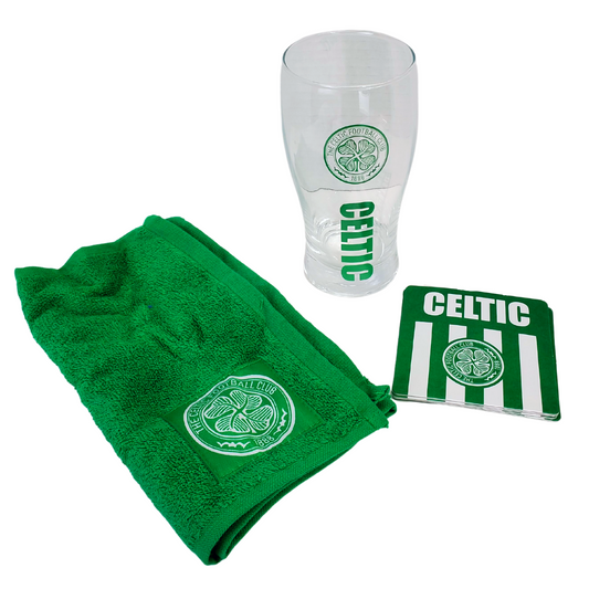 Official Celtic (football) at home bar kit. The photo contains a green celtic cloth with the official crest in the lower corner. Also featured in the photo is an official Celtic tulip pint glass with the official crest and the text "Celtic" The last item in this photo is a set of four Celtic coasters with the official Celtic crest. 