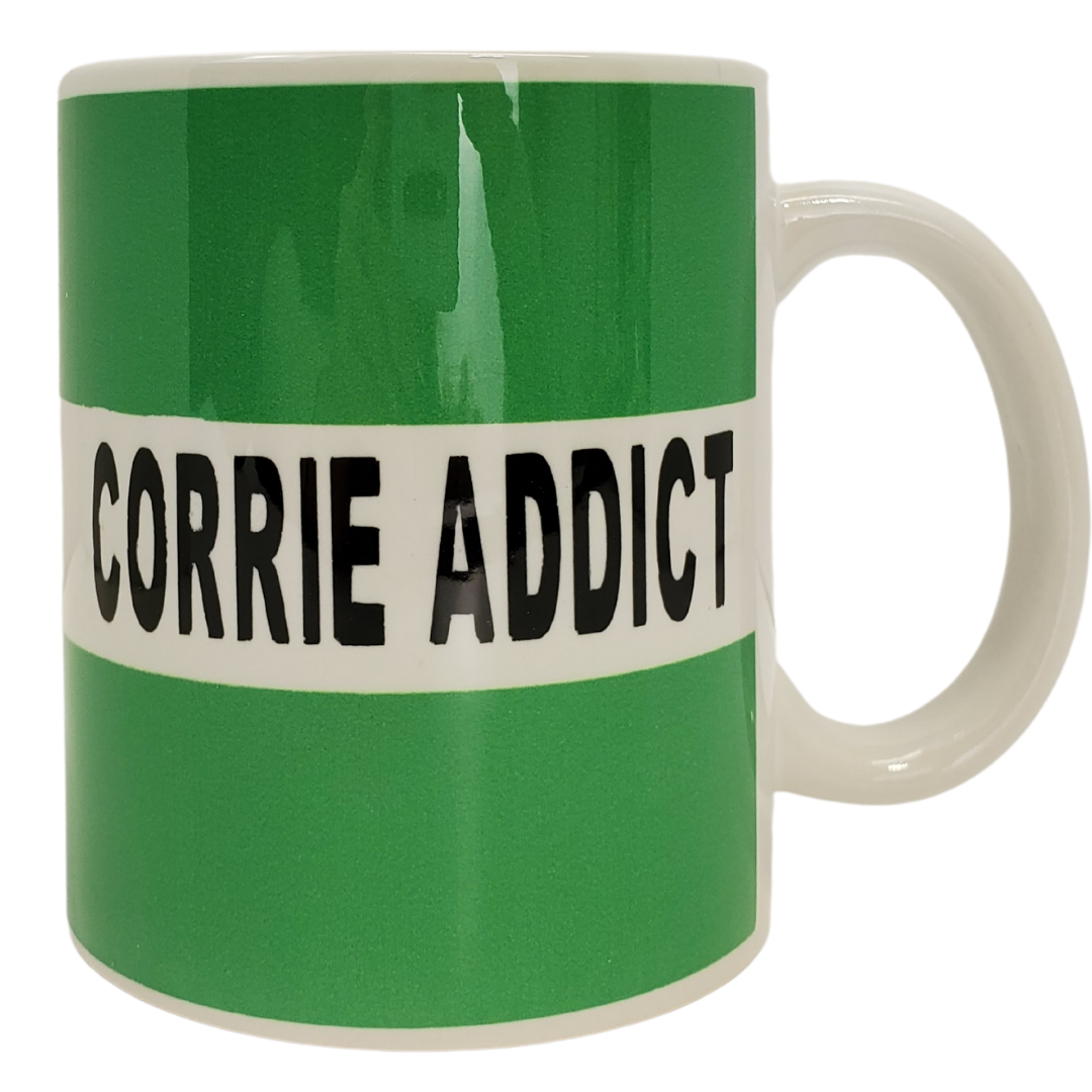 Enjoy your morning brew in our Corrie addict coffee mug. This is the perfect gift for the Coronation Street lover in your life! One side features the text "CORRIE ADDICT" the other side is a continuation of the green and white stripes displayed in the images. Standard-sized coffee mug.