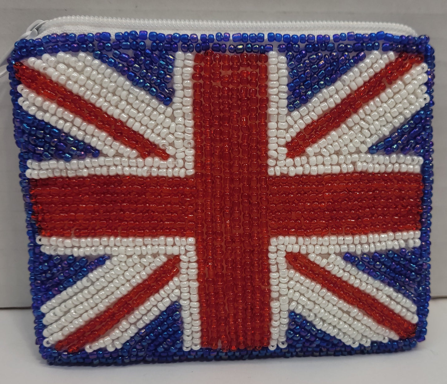 Union Jack beaded change purse with zipper.  Liner inside is white.