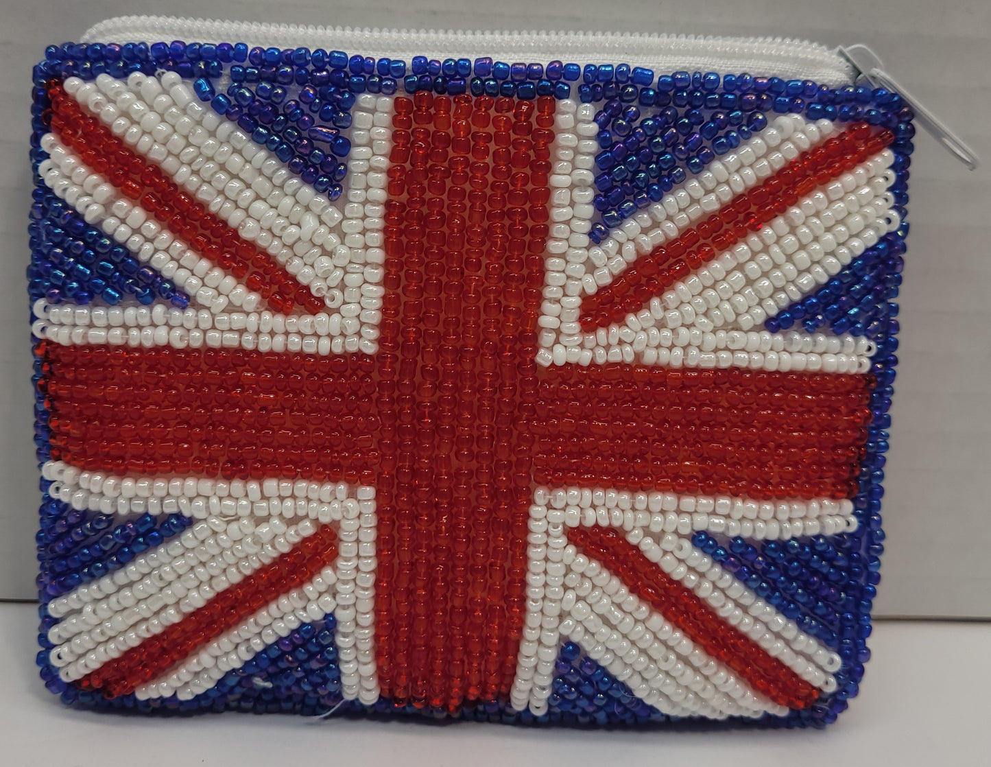 Union Jack beaded change purse with zipper.  Liner inside is white.