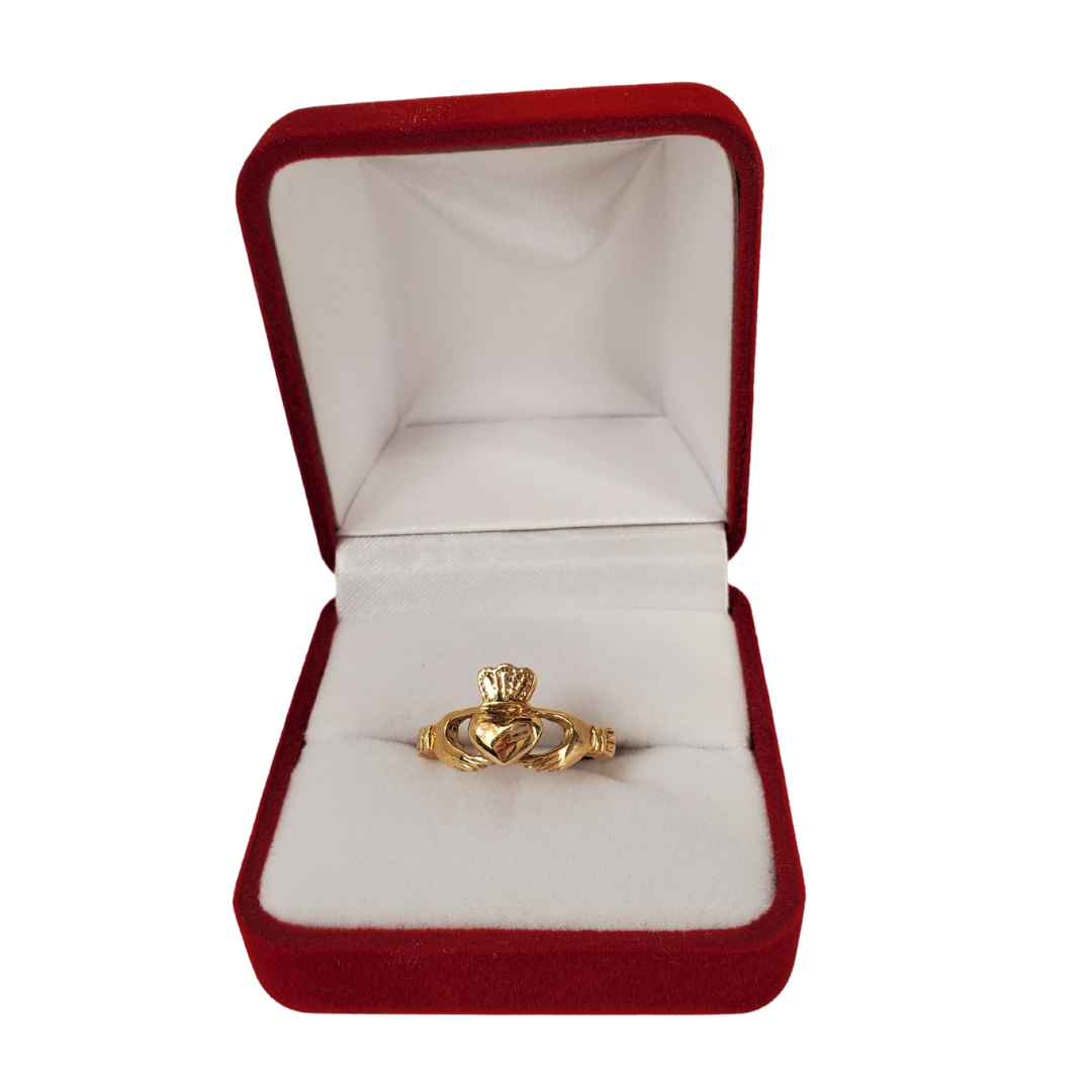 One of Ireland's most recognized images is the Claddagh. Two hands embrace a heart wearing a crown to symbolize pure love. Widely used as an engagement ring or a symbol of love this beautiful ring is sure to put a smile on your loved ones face.   We carry 10K and 14K yellow gold rings. Please allow 14 days for delivery. Contact us with the size of ring you would like. 