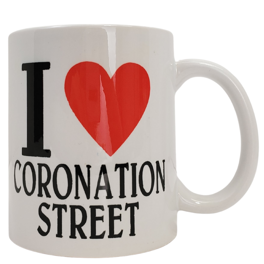 Enjoy your morning brew in our Coronation Street themed coffee mug. This is the perfect gift for the Coronation Street lover in your life! Features the text "I <3 CORONATION STREET". Standard-sized coffee mug.