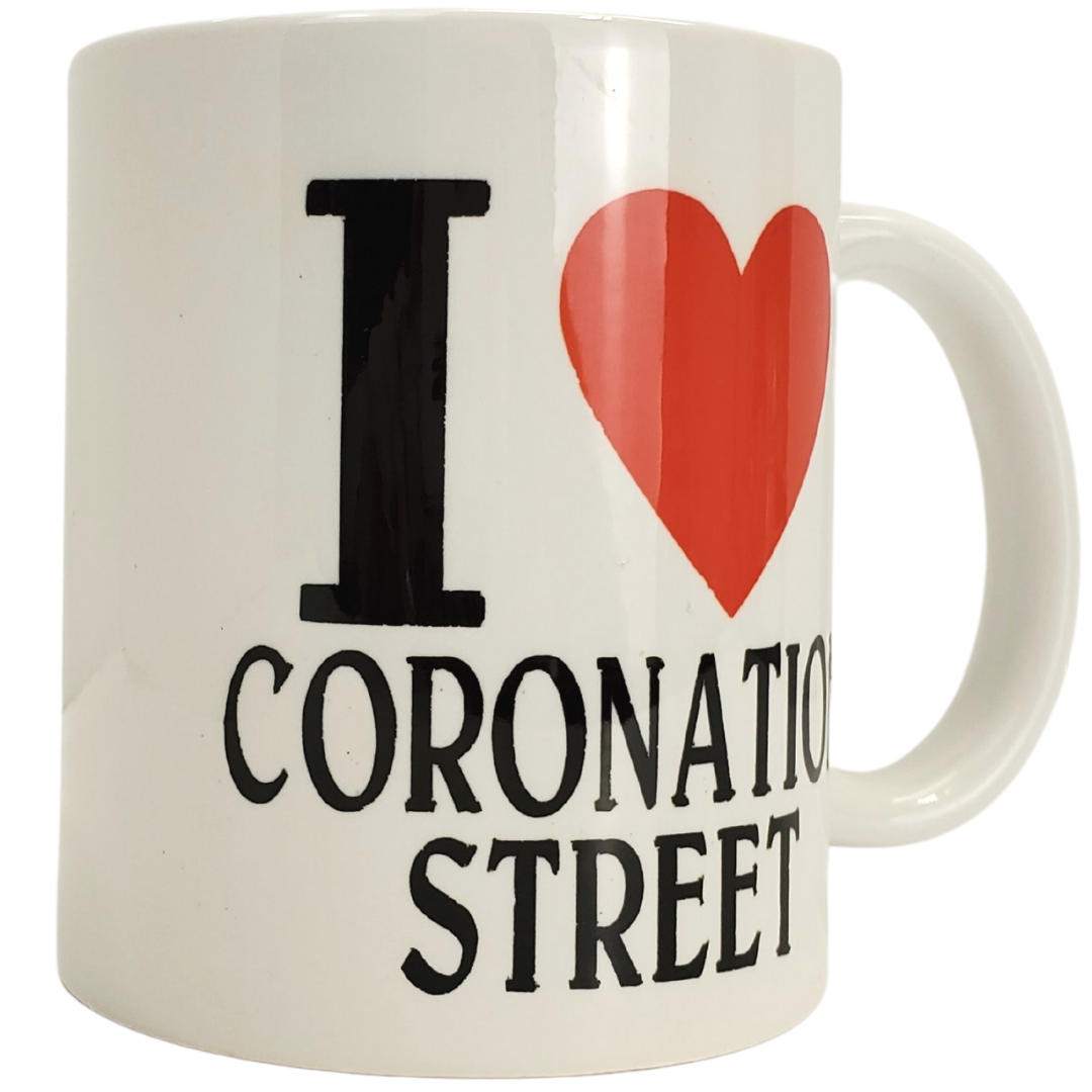 Enjoy your morning brew in our Coronation Street themed coffee mug. This is the perfect gift for the Coronation Street lover in your life! Features the text "I <3 CORONATION STREET". Standard-sized coffee mug.