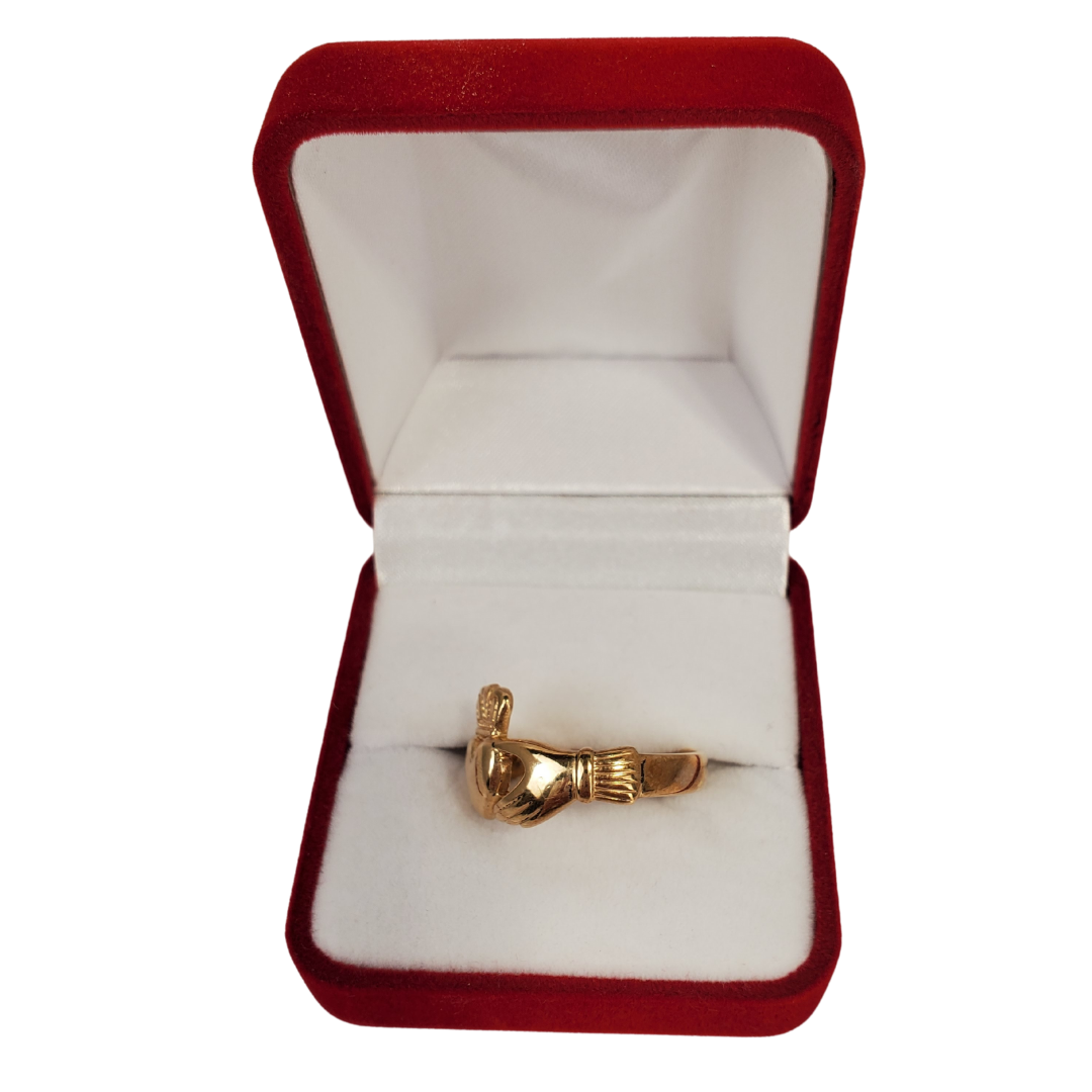 One of Ireland's most recognized images is the Claddagh. Two hands embrace a heart wearing a crown to symbolize pure love. Widely used as an engagement ring or a symbol of love this beautiful ring is sure to put a smile on your loved ones face.   We carry 10K and 14K yellow gold rings. Please allow 14 days for delivery. Contact us with the size of ring you would like. 