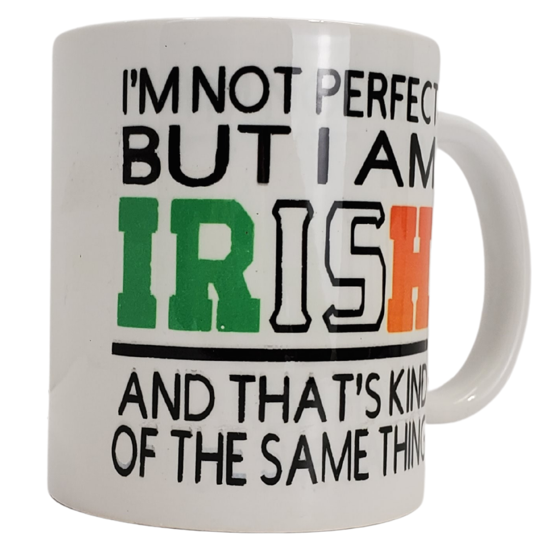 Make your Irish friends smile with our funny coffee mug. Printed on the mug is "I'M NOT PERFECT BUT I AM IRISH AND THAT'S KIND OF THE SAME THING." The lettering for the word Irish features the Ireland flag colours. Standard-sized coffee mug.
