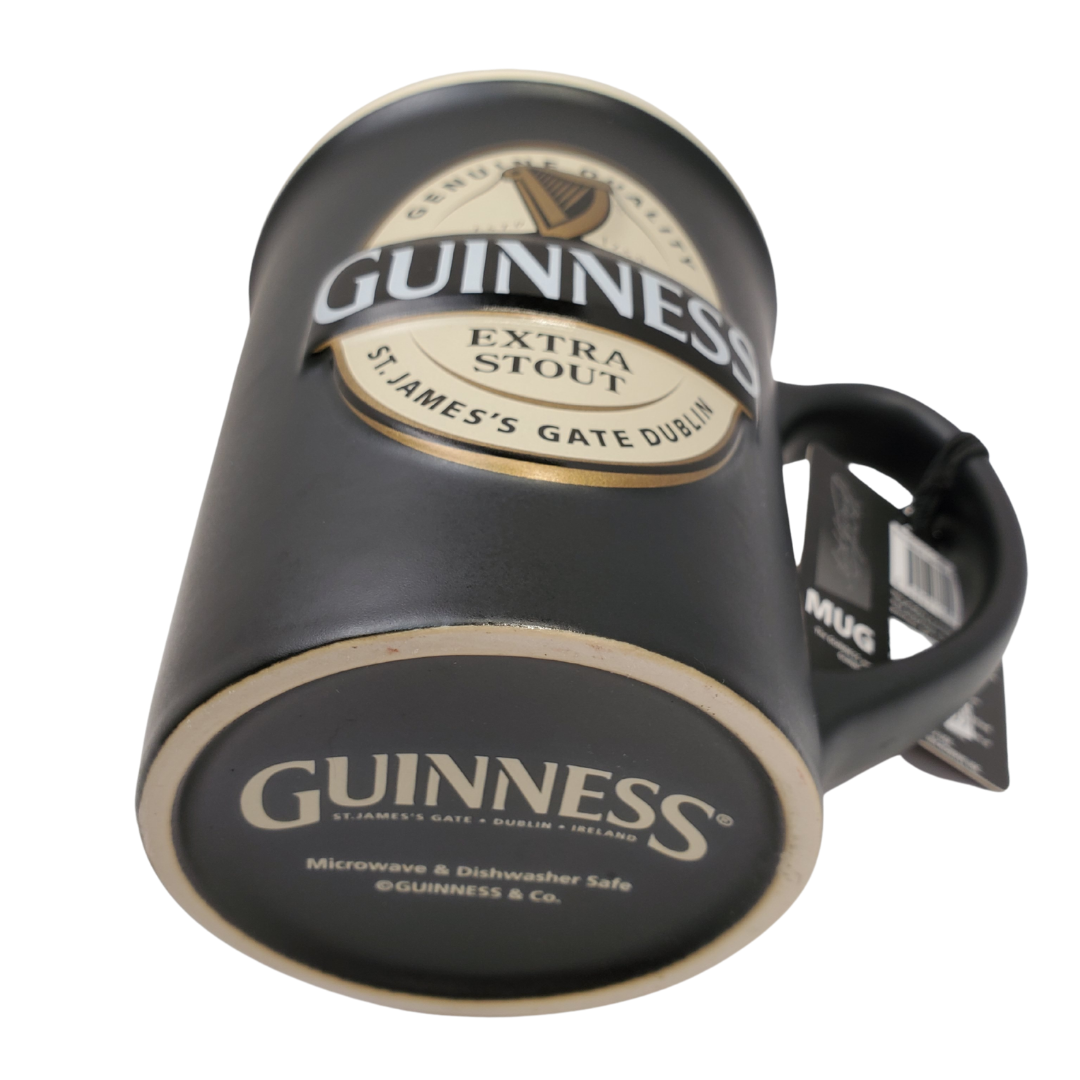 Fuel your morning with this official Guinness coffee mug. This stylish mug is sure to be your favourite go-to mug when brewing a cuppa! Designed with the Guinness label it is sure to remind you of Ireland, the home of the black stuff.   Official Guinness Product Ceramic  Microwave and dishwasher safe 