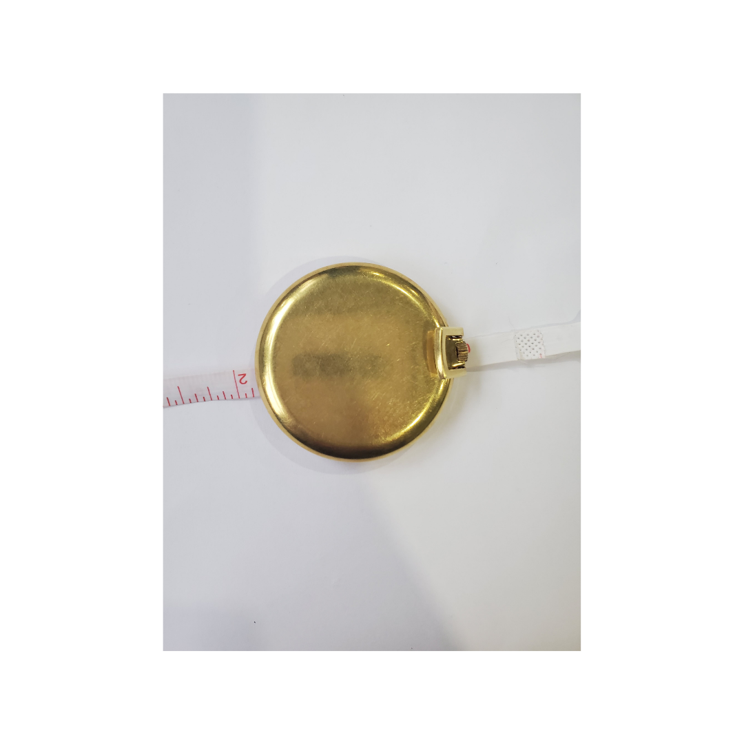 Back of watch with a tape measure - This beautiful piece is a rare find and a must-have for the collector! Dumai gold-filled pocket watch from CIRCA 1970s. 17 jewels Incabloc. Approxamatley 1 1/16th inches in wide.