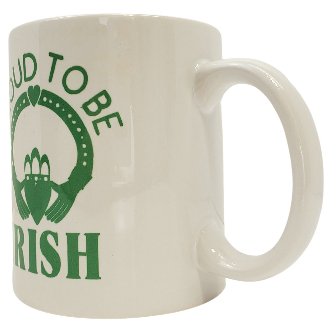 One of Ireland's most recognized images is the Claddagh: Two hands embrace a heart wearing a crown to symbolize the pure love that comes from friendship.  This mug is the perfect gift to give to your Irish friend to show them you cherish your friendship. Featuring the Claddagh and the text "PROUD TO BE IRISH."  Standard sized coffee mug. 