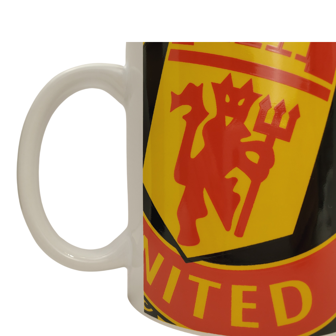 Manchester United mug. Vibrant mug with Manchester United club crest and logo. Ideal as a gift for any Manchester United supporters, and for serving hot drinks.  Great gift for Manchester United fans 100% Ceramic Licensed Manchester United product