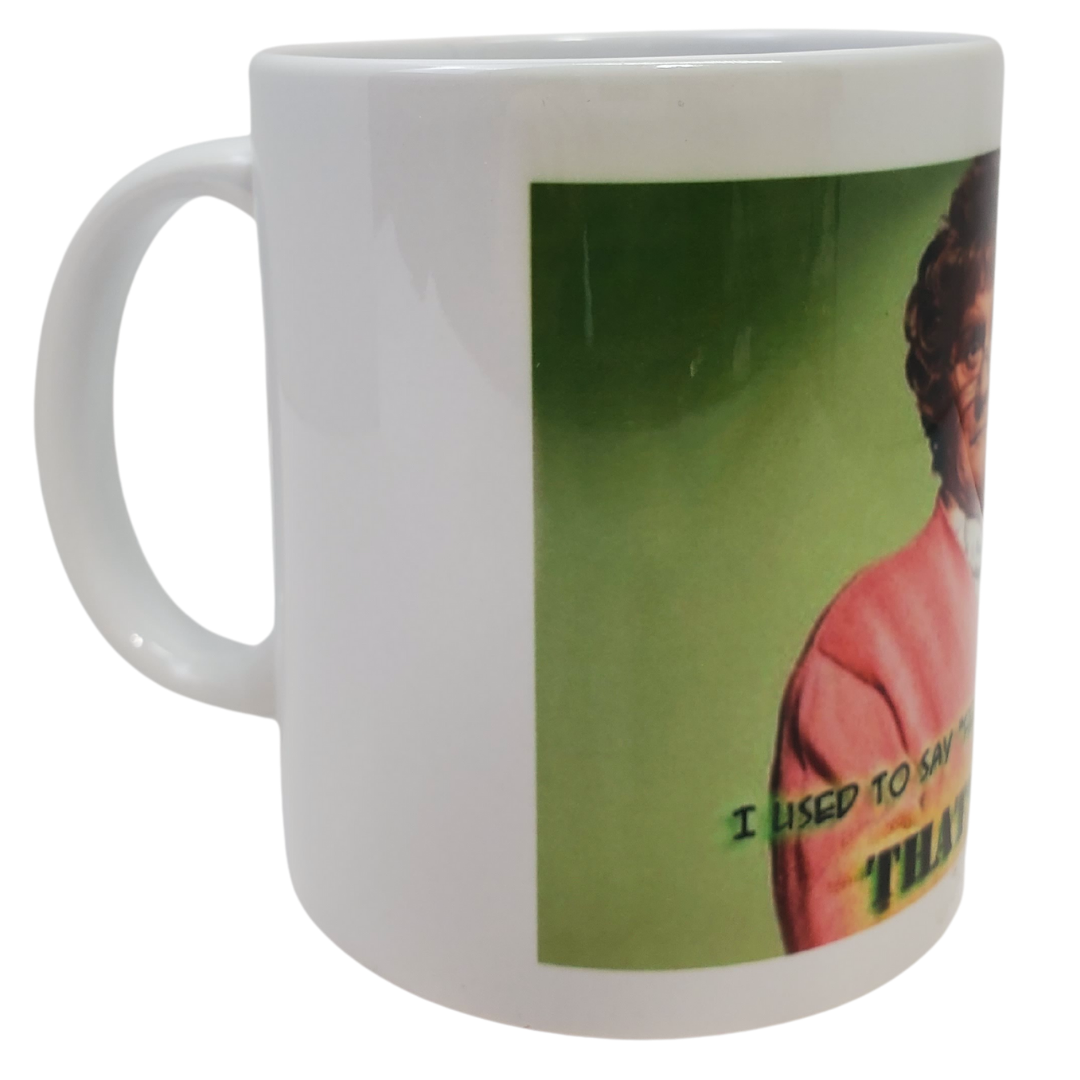 Side View of Mug - You're going to feckin' love this coffee mug! This coffee mug is perfect for the Mrs.Brown's boys fans! Featuring a cartoon image of Mrs.Brown with the text "I USED TO DAY "FECK OFF BUT NOW I SAY THATS NICE!" Standard sized coffee mug.   Get the matching magnet for only $2.99 with the purchase of a mug!
