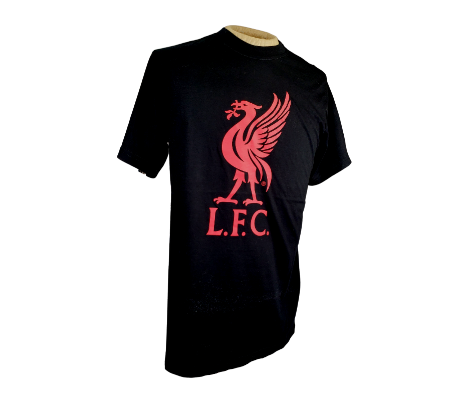 Whether you're cheering from the stands or from your couch this L.F.C. Tee is perfect! The Liverpool tee means your team spirit will be on display no matter where you go. This gorgeous red and black contrast is great to show off team spirit. This tee features the L.F.C. logo in the center. 