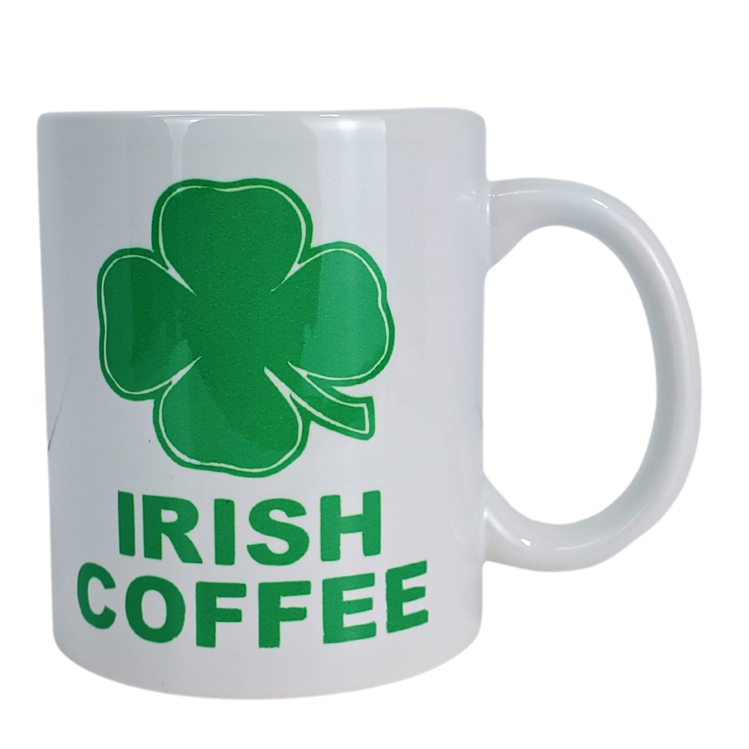 Enjoy your morning brew in this "Irish Coffee" coffee mug. One side features a four-leaf clover to bring some luck to your day! Below the four-leaf clover is the text "IRISH COFFEE." Standard sized coffee mug.