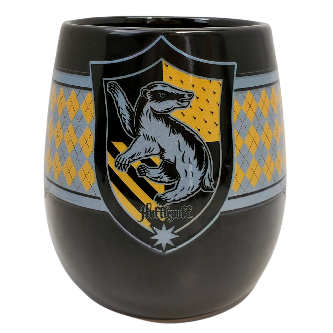 Loyalty, friendship, and hard work are what a Hufflepuff brings to the table. What better way to support your friends than with this Hufflepuff coffee mug. Celebrate your favourite parts of the famous Harry Potter world with these amazing mugs!