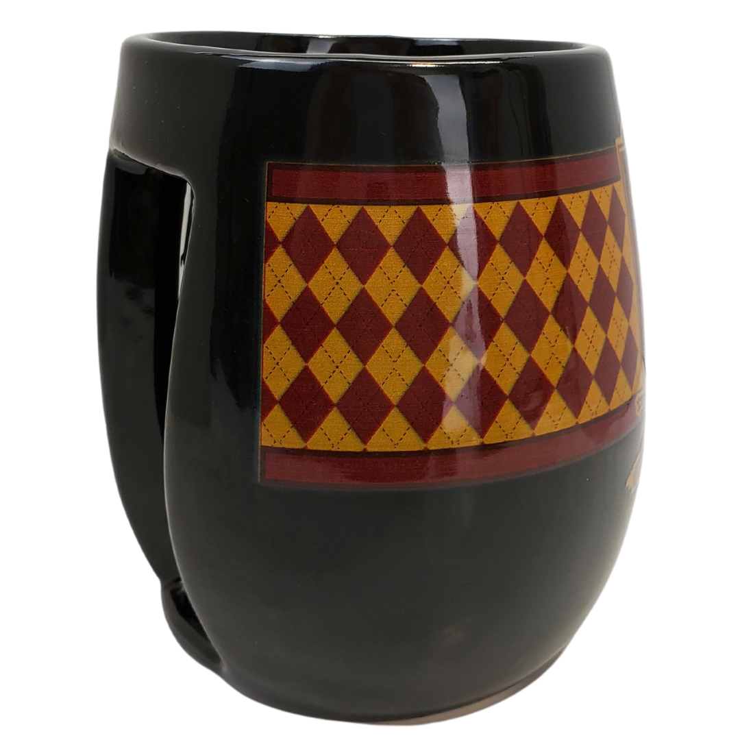 Courage, chivalry, and determination are what a Gryffindor brings to the table. What better way to support your friends than with this Gryffindor coffee mug. Celebrate your favourite parts of the famous Harry Potter world with this amazing mugs!