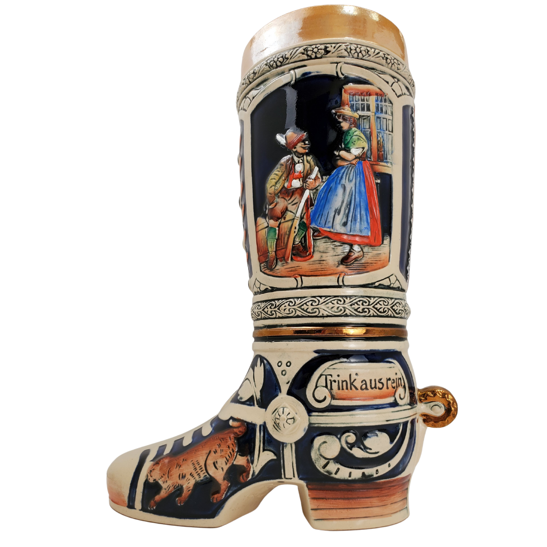 Ceramic boot made in Western Germany (no longer exists). Covered in beautiful colours and intricate designs. 8" x 10.5" x 5"   Small chip around the opening, no other damage. Great condition. 