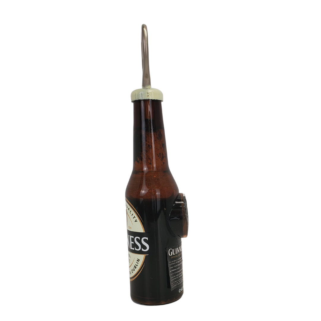 What better way to open up your Guinness than with a mini Guinness bottle, bottle opener? This mini bottle of beer features the extra stout Guinness label on the front that wraps around the back. The back of the bottle opener has a magnet so you can stick it on your fridge and never lose it!