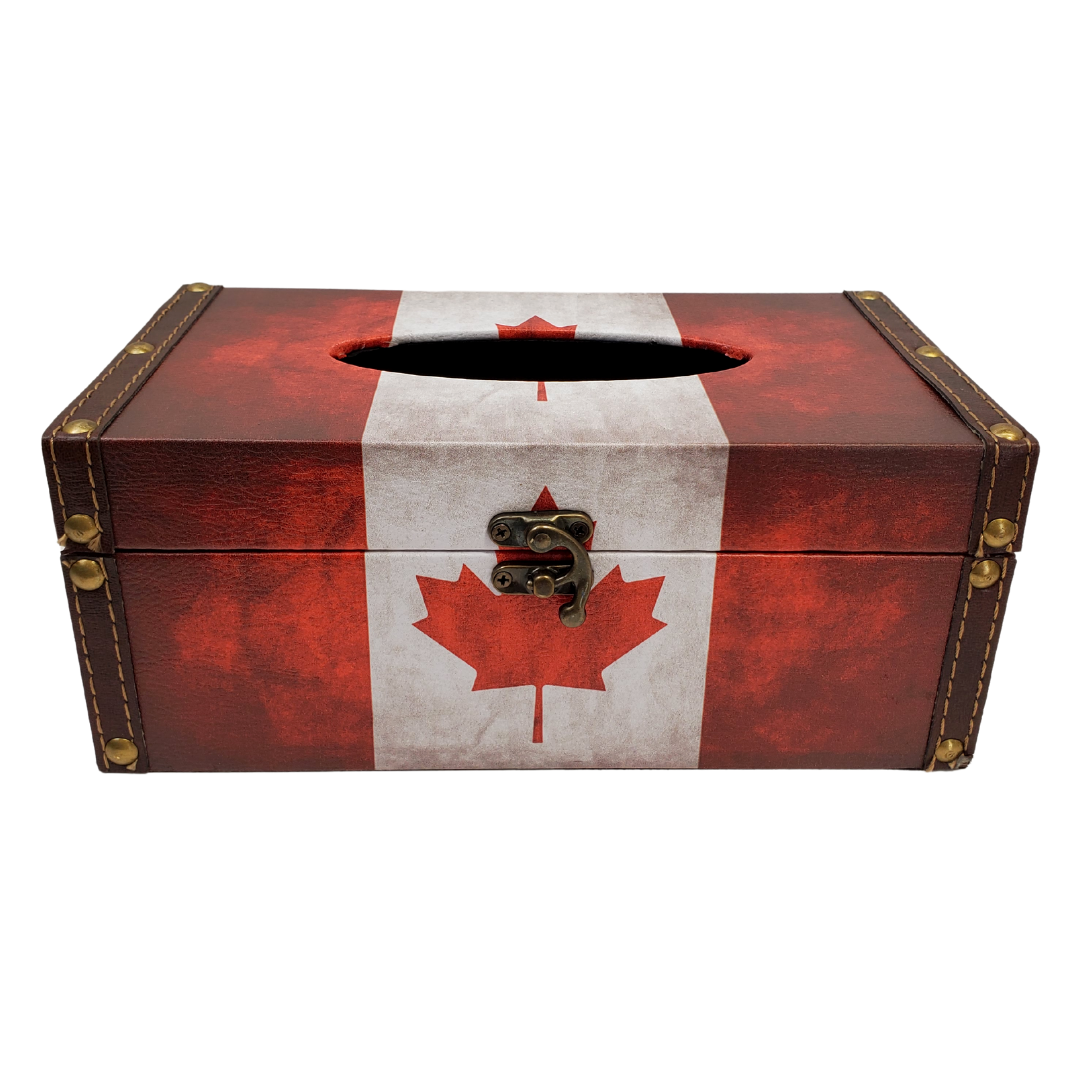 Canada flag tissue box. Has a burnt effect to it to give it a rugged antique look. The edges are wrapped in a faux leather with gold coloured studs. 