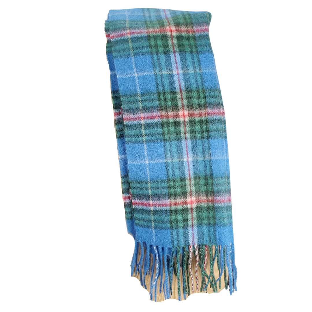 This gorgeous scarf is sure to keep you warm this winter. Made with 100% lambswool.  It is said that the blue and white in the tartan stands for the Atlantic Ocean and the whitecaps of the surf. The light green represents Nova Scotia's deciduous forests, while the dark green represents the coniferous. Red stands for the Lion Rampant prominently displayed on the Provincial Coat of Arms. Last, gold represents Nova Scotia's historic Royal Charter of 1621 and the subsequent Grant of Arms in 1625.