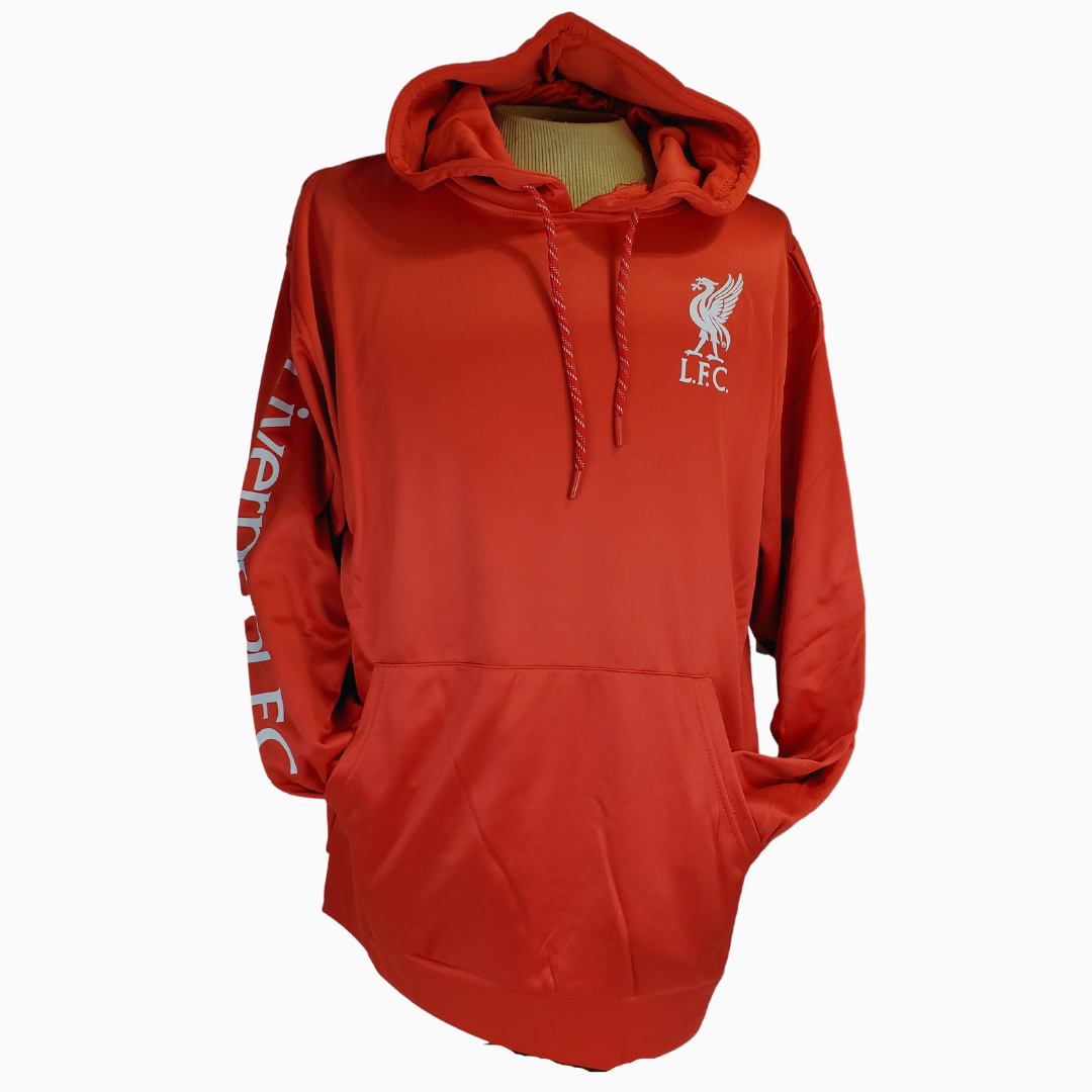 Whether you are cheering from the stands or cheering from the couch you can show your team spirit off with this vibrant red hoodie. This Liverpool Football Club hoodie has the official team logo printed on the chest with the text L.F.C. immediately below it. Down the sleeve has the printed text "Liverpool FC." Also features a kangaroo patch and drawstring hood.