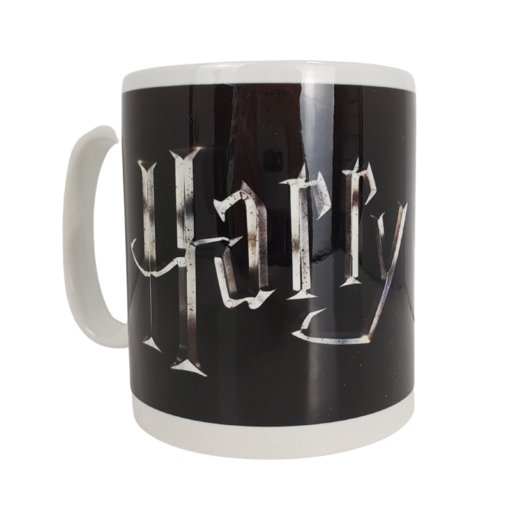 Snuggle up with a warm cuppa while watching the marvelous magical world of Harry Potter with your own Harry Potter themed coffee mug.  Care Instructions: Dishwasher and microwave safe.