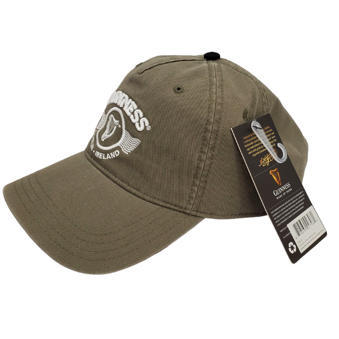 Side view of the army green Guinness ballcap. Has the text "GUINNESS" in the center. Below the text is the famous Guinness harp enclosed in a circle. Below the harp is the text "DUBLIN IRELAND" that curves along the bottom of the circle the harp is enclosed in.