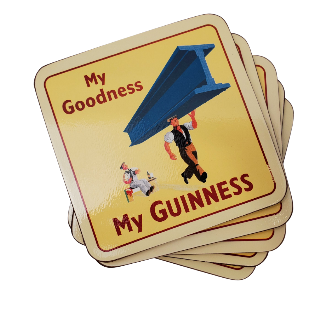 Stack of six Guinness coasters. The one on the top features a man carrying a large steel beam with one arm. And a man sitting in the background with a surprised experssion on his face.  The text on the coaster says "My Goodness, My Guinness."