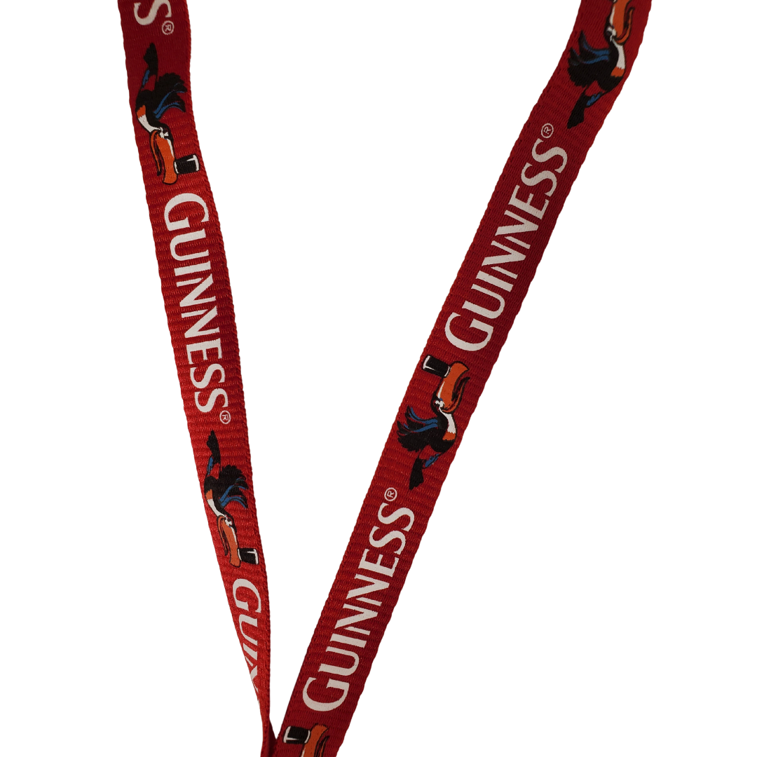 Close up to Design - Never lose your keys again with this stylish Guinness lanyard. This stunning red lanyard features the world famous Guinness toucan mascot, balancing a delicious pint of beer off its beak.
