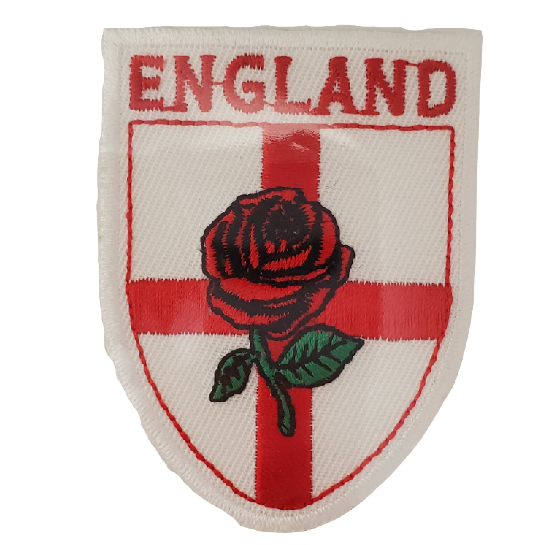 Add a splash of colour onto your fabrics with our iron-England patch. Patch includes the England flag with a red rose in the center.
